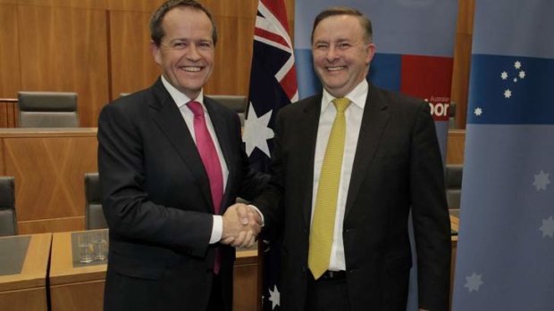 ALP leader Bill Shorten shakes hands with defeated candidate Anthony Albanese.