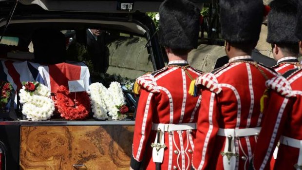 The coffin of Fusilier Lee Rigby arrives for a vigil at Bury Parish Church in Bury, northern England.