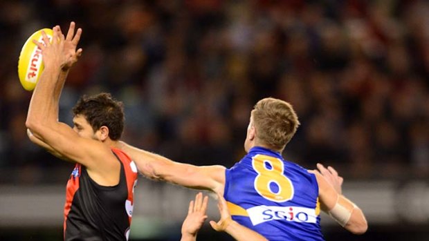 Bombers away: Paddy Ryder marks in front of Beau Waters and Sam Lonergan.