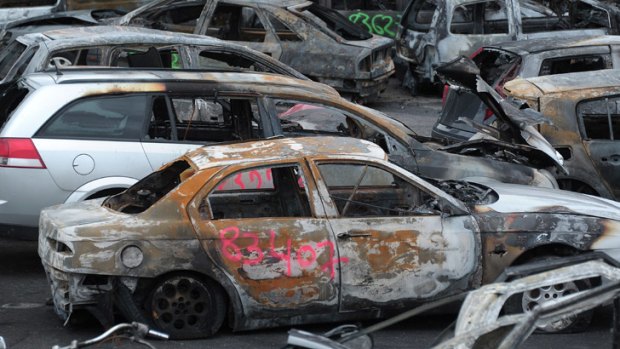 Cars torched during New Year's Eve in Strasbourg's area are parked at the pound of Strasbourg, eastern France January 1, 2013. Photo: REUTERS/Jean-Marc Loo