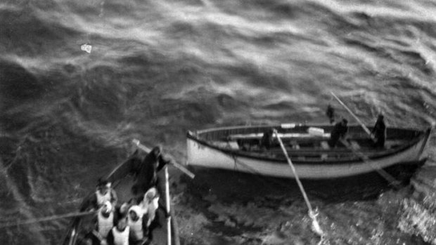 Lifeboats from the Titanic approach the rescue ship Carpathia.