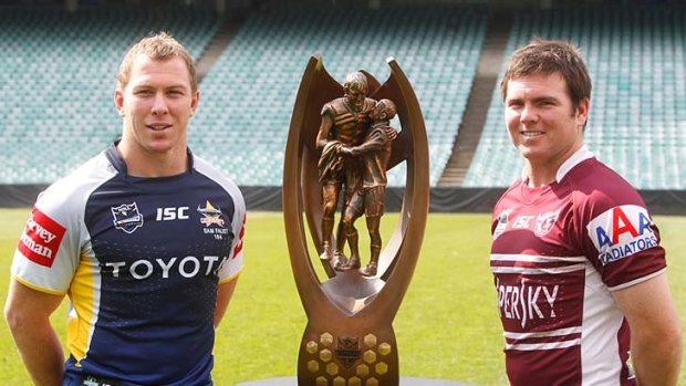 "We're at peace with it now" ... Cowboys captain Glenn Hall, pictured left with the NRL trophy and opposing Manly captain Jamie Lyon, speaks of his stillborn baby boy.