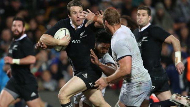 Unstoppable: All Blacks fullback Ben Smith makes a break during New Zealand's record-equaling win over England.