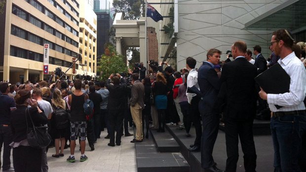 The media scrum outside court for the Rayney trial.