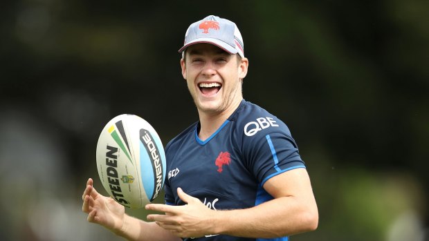 All smiles: Luke Keary shares a joke with a teammate during Roosters training.