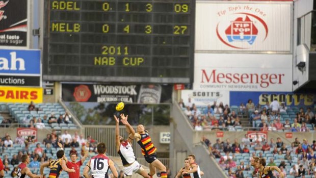 Adelaide plays Melbourne in the NAB Cup at AAMI Stadium... the SANFL blames the media for not doing enough to promote the venue.