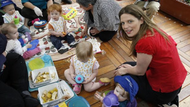Thirty children a day ... the Childcare Minister, Kate Ellis, at the Capital Hill Early Childhood Centre at Parliament House.