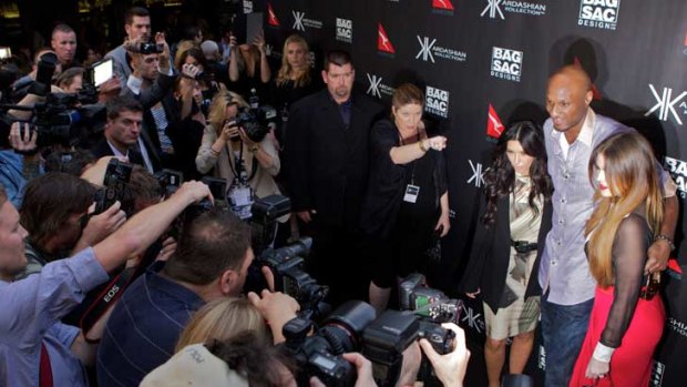 Kim and Khloe Kardashian with Khloe's husband LA Lakers basketballer Lamar Odom shortly after arriving in Australia in early November.