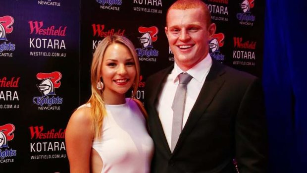 Motivation: Alex McKinnon with fiancee Teigan Power, whom he hopes to walk down the aisle at their wedding.