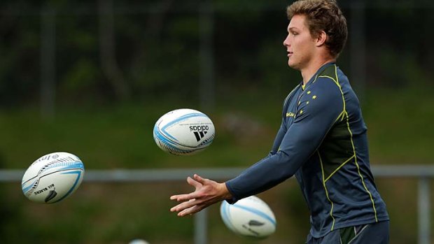 Focused: Wallabies flanker Michael Hooper takes part in a training drill in Wellington.