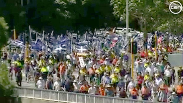 Hundreds of angry workers jeered the Premier this morning.