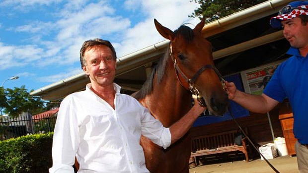 Bargain . . . Rick Jamieson, left, with his yearling, which is a half-brother to Black Caviar, at Newmarket yesterday.