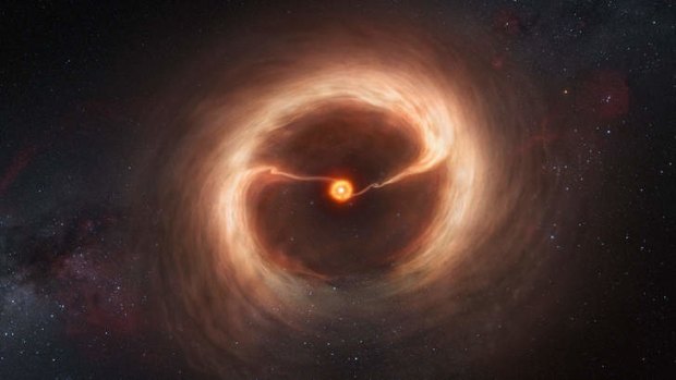 An artist's impression of the disc of gas and cosmic dust around the young star HD 142527. Astronomers using the Atacama Large Millimeter/submillimeter Array (ALMA) telescope have seen vast streams of gas flowing across the gap in the disc, giving them new evidence about how it and other planets came to be.
