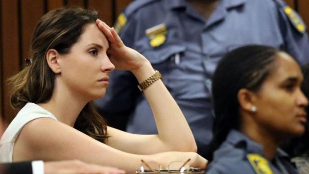 Aimee Pistorius (left), the sister of South African Paralympic athlete Oscar Pistorius, attends his sentencing.