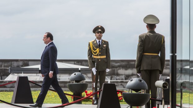 President Francois Hollande of France arrives for a commemoration ceremony at the Armenian genocide memorial in Yerevan, Armenia. 