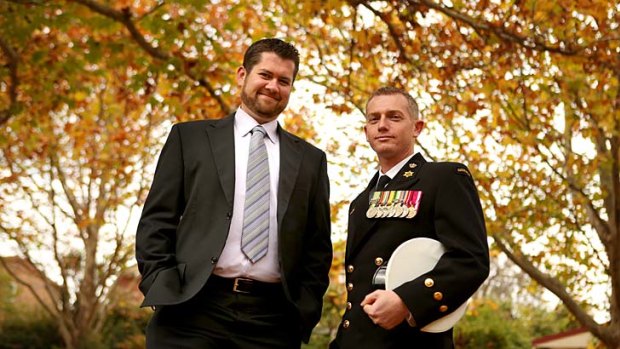 Chris Matterson, who works at the Department of Defence, and his partner, Chief Petty Officer Stuart O'Brien.