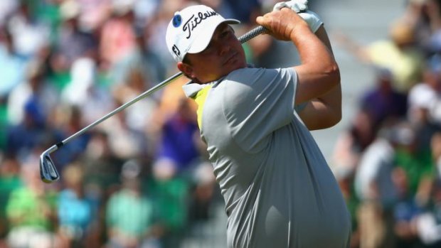 All hands: Jason Dufner is a complete contrast to his playing partners.