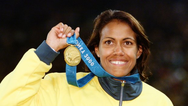 An ecstatic Cathy Freeman in 2000, the first Australian to win gold in the women's 400 metres since Betty Cuthbert.