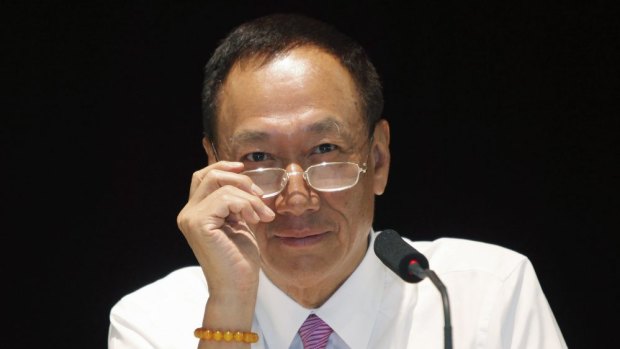 Billionaire Terry Gou promised higher earnings at Hon Hai, flagship of Foxconn, even as analysts predict the maker of Apple's iPhones and iPads will post its first profit drop in five years.