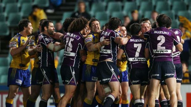 Settle down ... tempers flare between the Storm and Eels players at Parramatta Stadium last night. The home side ran out 24-10 winners.