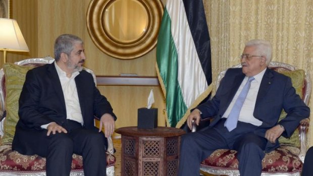Palestinian President Mahmoud Abbas (right) meets Hamas leader Khaled Meshal in Doha, Qatar.