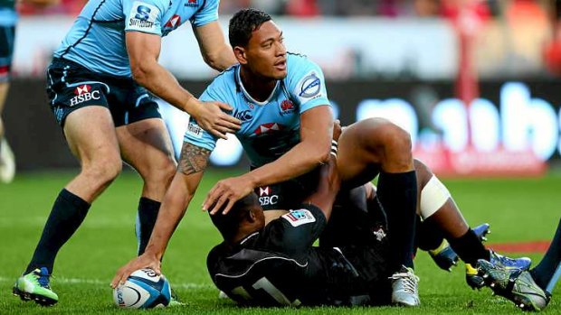 Happy: Waratahs try-scorer Israel Folau is enjoying his time in his third code and is likely to snub offers from league to stay in rugby beyond this season.