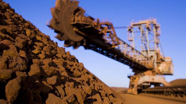 The world's top 40 mining companies combined market value dropped 23 per cent to $958 billion over the past 12 months.