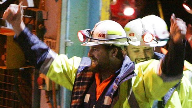 Miners Todd Russell, left, and Brant Webb emerge  after spending two weeks trapped nearly a kilometre underground in the Beaconsfield Gold Mine.