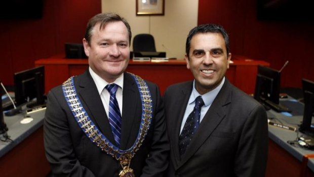 Mayoral return: Kent Johns, left, with deputy mayor Carmelo Pesce.