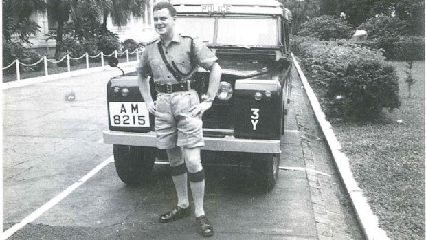 On the beat: Nigel Hadgkiss in front of Hong Kong's Tsim Sha Tsui police station in 1970, where he worked before migrating to Australia.