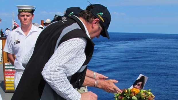 Families of those killed on AHS Centaur cast wreaths at the ship's final resting place off the Sunshine Coast.