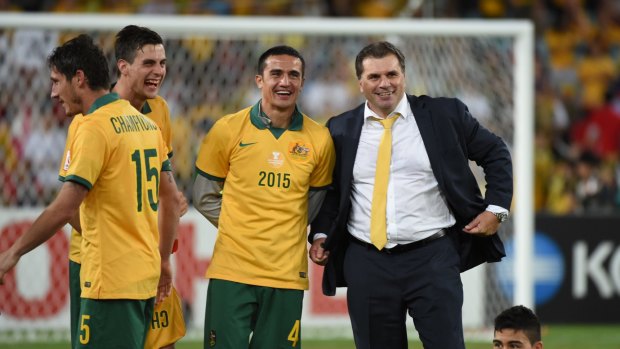 Ange Postecoglou enjoys the Socceroos'  victory in the AFC Asian Cup Final 2015. 