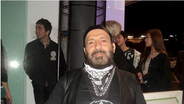 Man Haron Monis, pictured in Rebels bikie gear, was known to Amanda Morsy as Michael Hayson - a luxury car driving accountant from Romania.