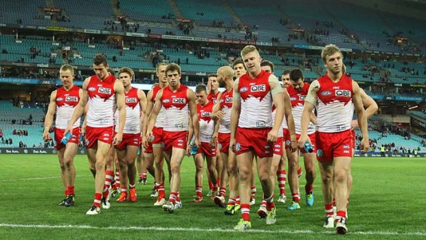 The Sydney Swans leave the ground after losing 100-71.