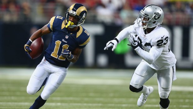 Tavon Austin #11 of the St Louis Rams runs up field after making a catch against Tarell Brown #23 of the Oakland Raiders during the Rams 52-0 thrashing of Oakland.