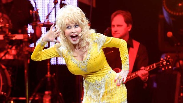 Hello Dolly ... Dolly Parton plays the crowd.