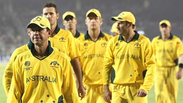 Ricky Ponting leads his team from the field after their World Cup quarter-final loss.