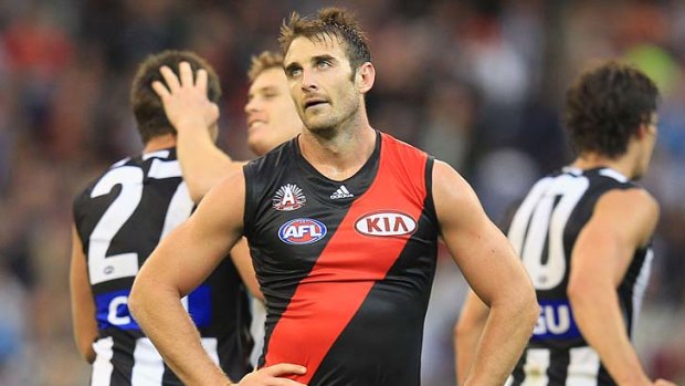 Not impressed: Jobe Watson is visibly upset after the crushing loss to Collingwood on Wednesday.