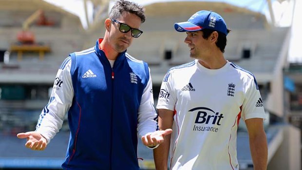 Listen here: Kevin Pietersen imparts some of his knowledge to England captain Alastair Cook at the Adelaide Oval on Wednesday.