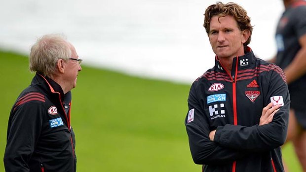 Essendon club doctor Bruce Reid with coach James Hird at training Thursday morning.