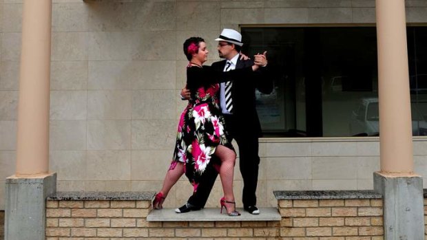 Christian Riley and Serkan Alasya practise their tango moves at the Italian Cultural Centre, Forrest.