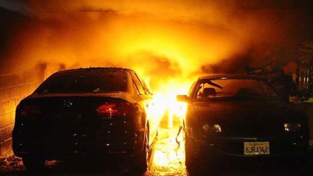 Fifty-five fires ... a carport blaze set off by an arsonist.