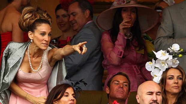 Keeping up ... Sarah Jessica Parker, with Shane Warne and Elizabeth Hurley, met her commitments at the Crown Oaks marquee yesterday.