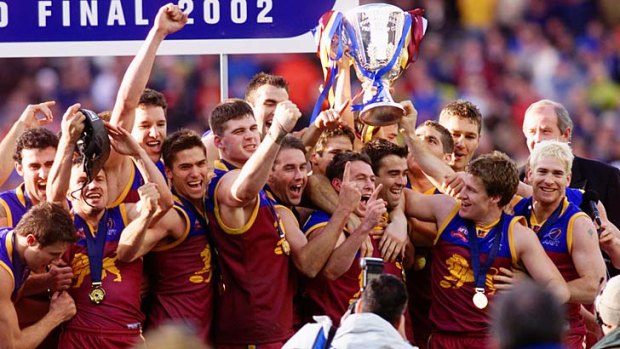 Mighty roar: Brisbane after beating Collingwood in 2002.
