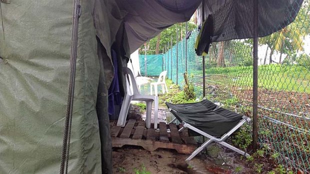 Photos smuggled out of the Manus Island show the conditions at the island's processing camp.