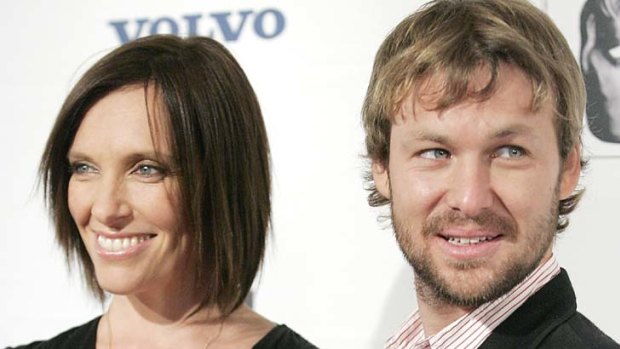 Wary ... Toni Collette and David Galafassi are being sued over a Paddington house.
