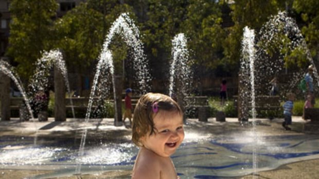 People power...Lily Cameron, 14 months cools off in Pirrama Park yesterday.