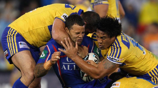 Evarn Tuimavave of the Knights is tackled.