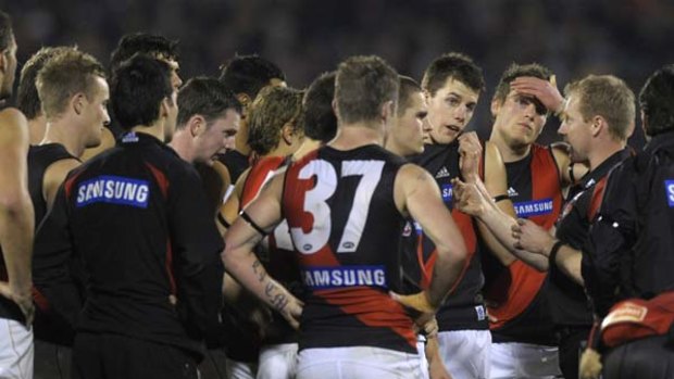 Essendon coach Matthew Knights addresses his players during his team's debilitating loss to Adelaide two weeks ago.