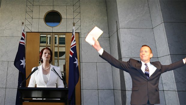 Julia Gillard says that Australians will have a clear choice between her and Opposition Leader Tony Abbott. <i>Pictures: Stefan Postles, Paul Harris </i>